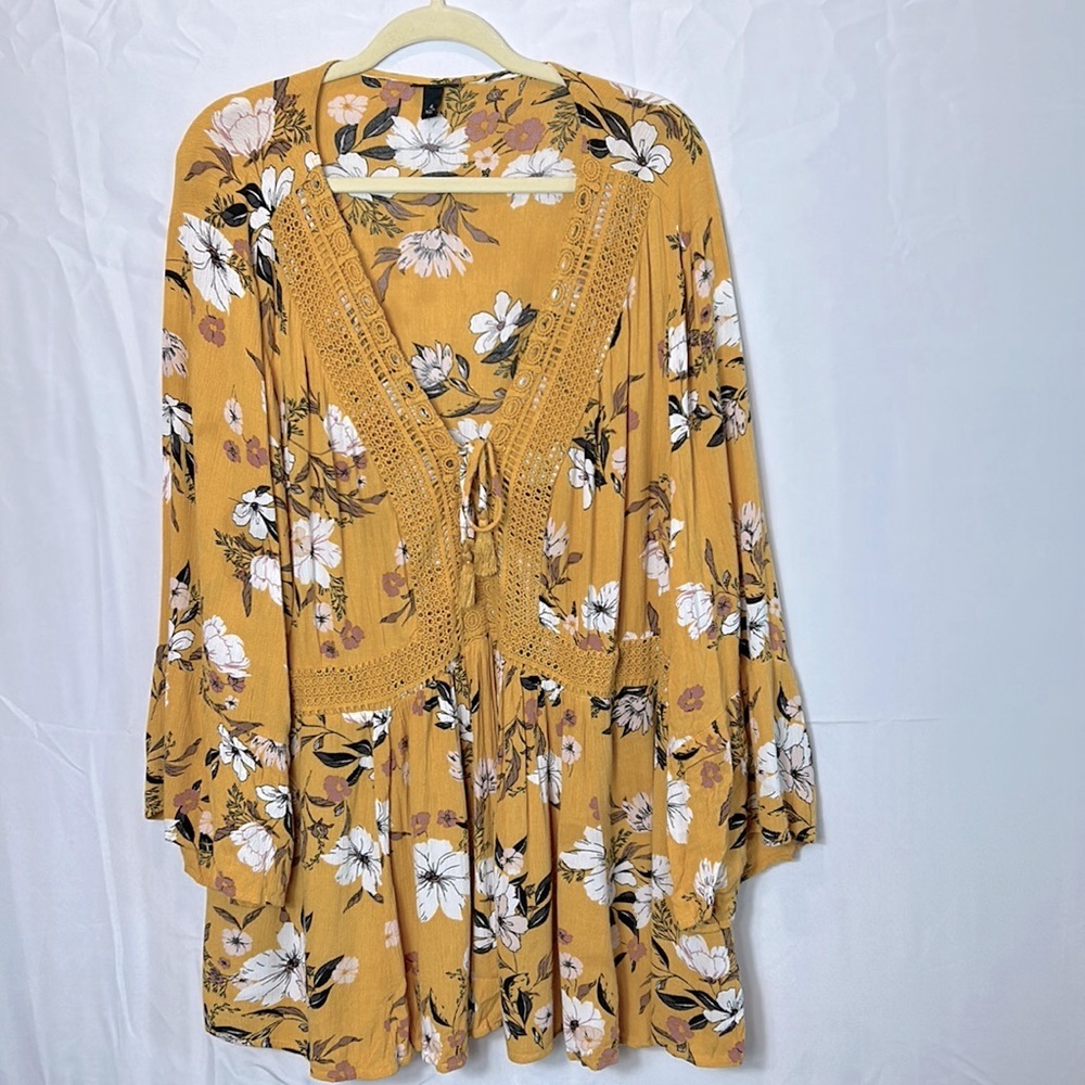 Torrid Floral Bell Sleeve Top size 4(4x). Gold Colored Front Tie and Appliqué
